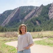 Emily King Kinsey in front of ɫ Flatirons